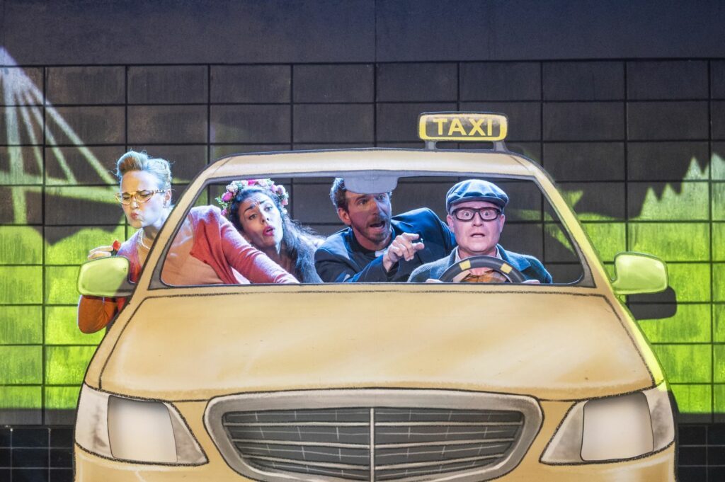 Himmel und Kölle Ensemble im Taxi